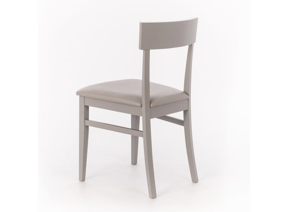 4 chaises réalisées avec assise en simili cuir, structure et pieds en bois laqué - Taikiri Viadurini