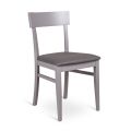 4 chaises réalisées avec assise en simili cuir, structure et pieds en bois laqué - Taikiri