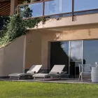 Chaise longue d'extérieur en polyrotin avec roues - Meredith Viadurini