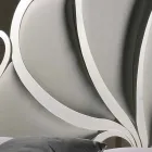 Lit double rembourré avec des cristaux de fer Kimberly Viadurini