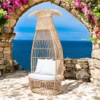 Fauteuil de jardin en polyrotin tressé avec coussin blanc cassé - Anteia Viadurini