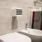 Porte-rouleau de salle de bain en Corian blanc ou avec inserts noirs Design italien - Elono Viadurini