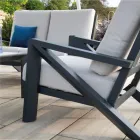 Salon composé d'un canapé, d'une table basse et de fauteuils avec repose-pieds - Tableau d'affichage Viadurini