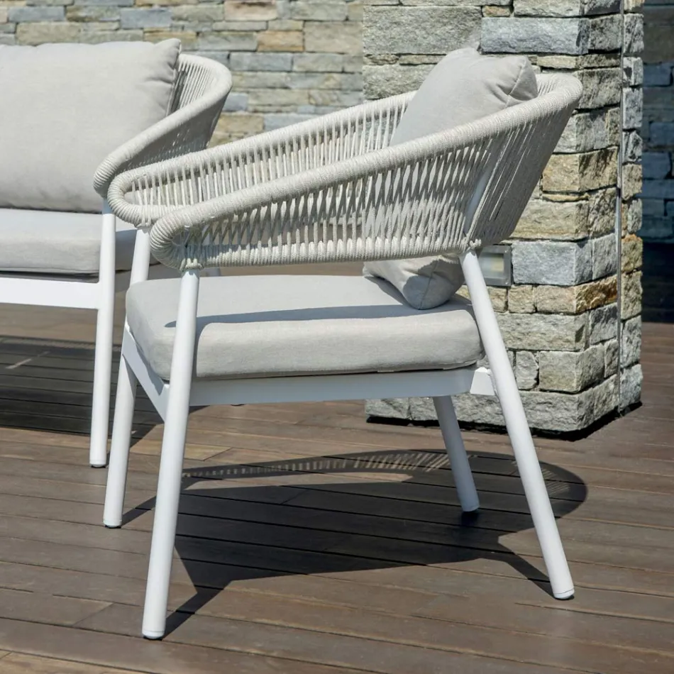 Salon d'extérieur avec coussins arrondis et accoudoirs - Zenith Viadurini