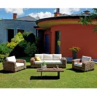 Salon de jardin en rotin avec table basse en bois et coussins - Hugues Viadurini