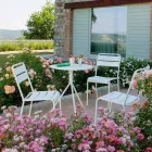 Chaise d'extérieur empilable enduite de poudre fabriquée en Italie, 4 pièces - Amina Viadurini