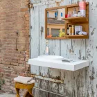 Meubles de salle de bain suspendus au design moderne dans une surface solide à Brusson Viadurini