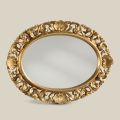 Miroir ovale avec cadre en bois perforé à la feuille d'or Made in Italy - Florence