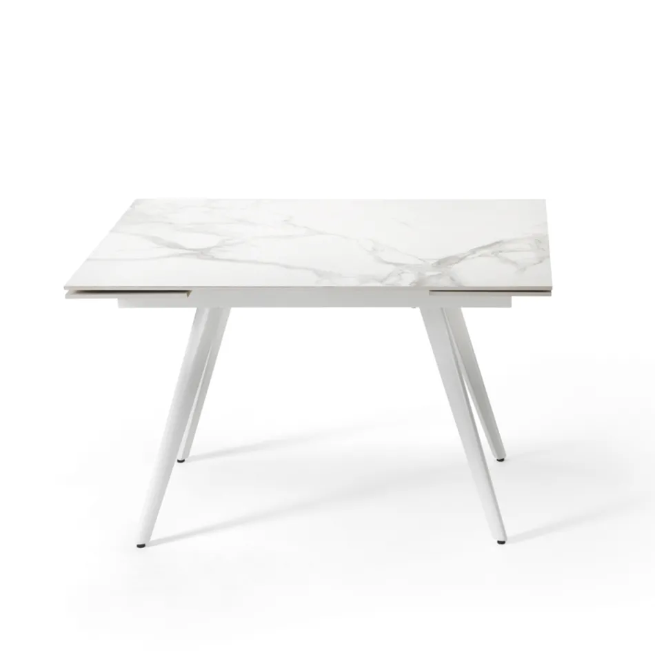 Table extensible jusqu'à 180 cm en pierre effet marbre et métal - Numa Viadurini