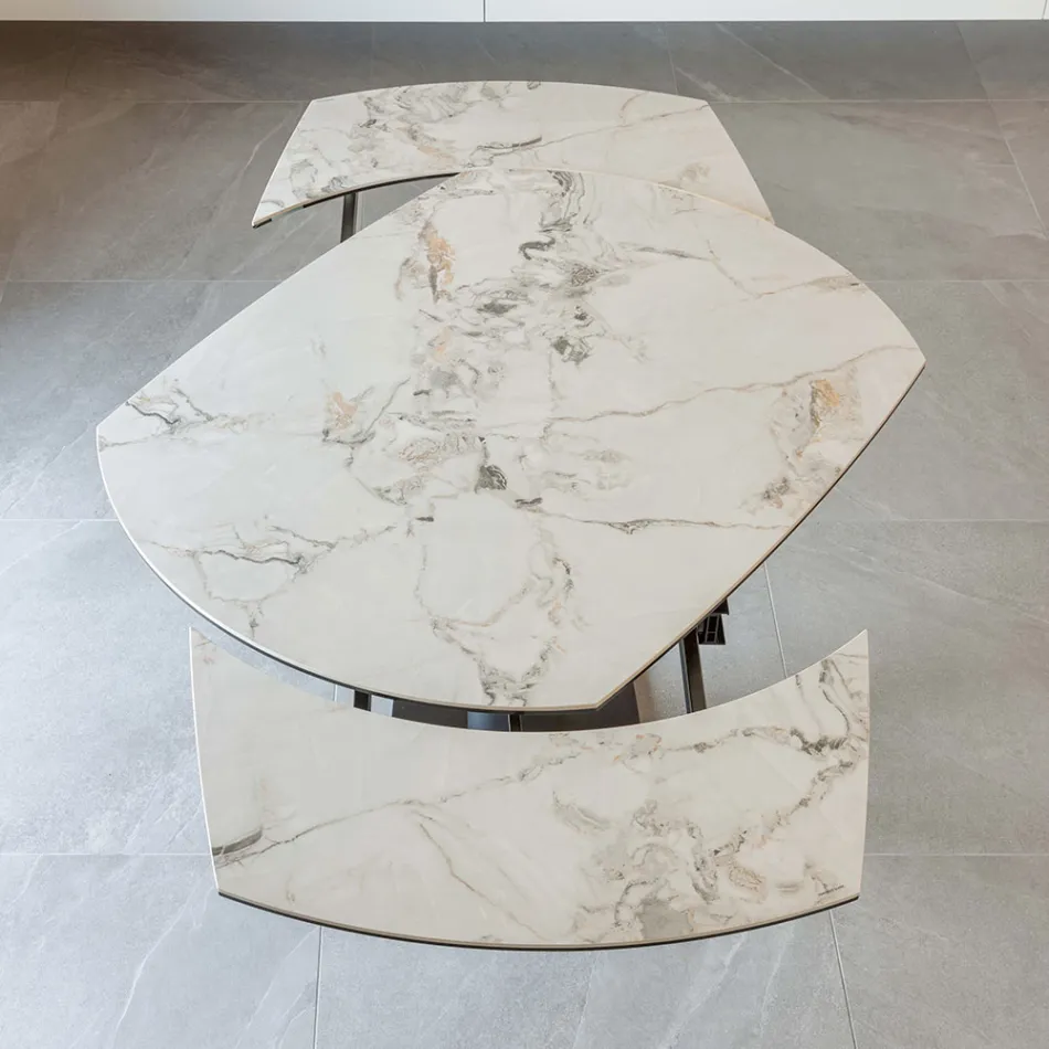 Table à manger extensible en céramique et base en métal - Indira Viadurini