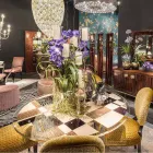 Modeno Table ronde avec plateau en verre et des incrustations de bois Ozzy Viadurini