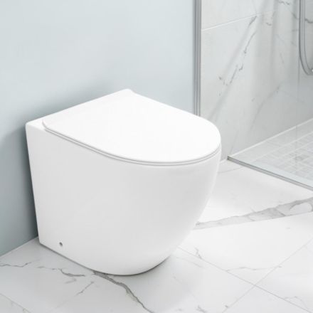 Toilettes Aralia blanches en céramique, à montage sur pied et à effet cyclonique, avec siège à fermeture amortie Viadurini