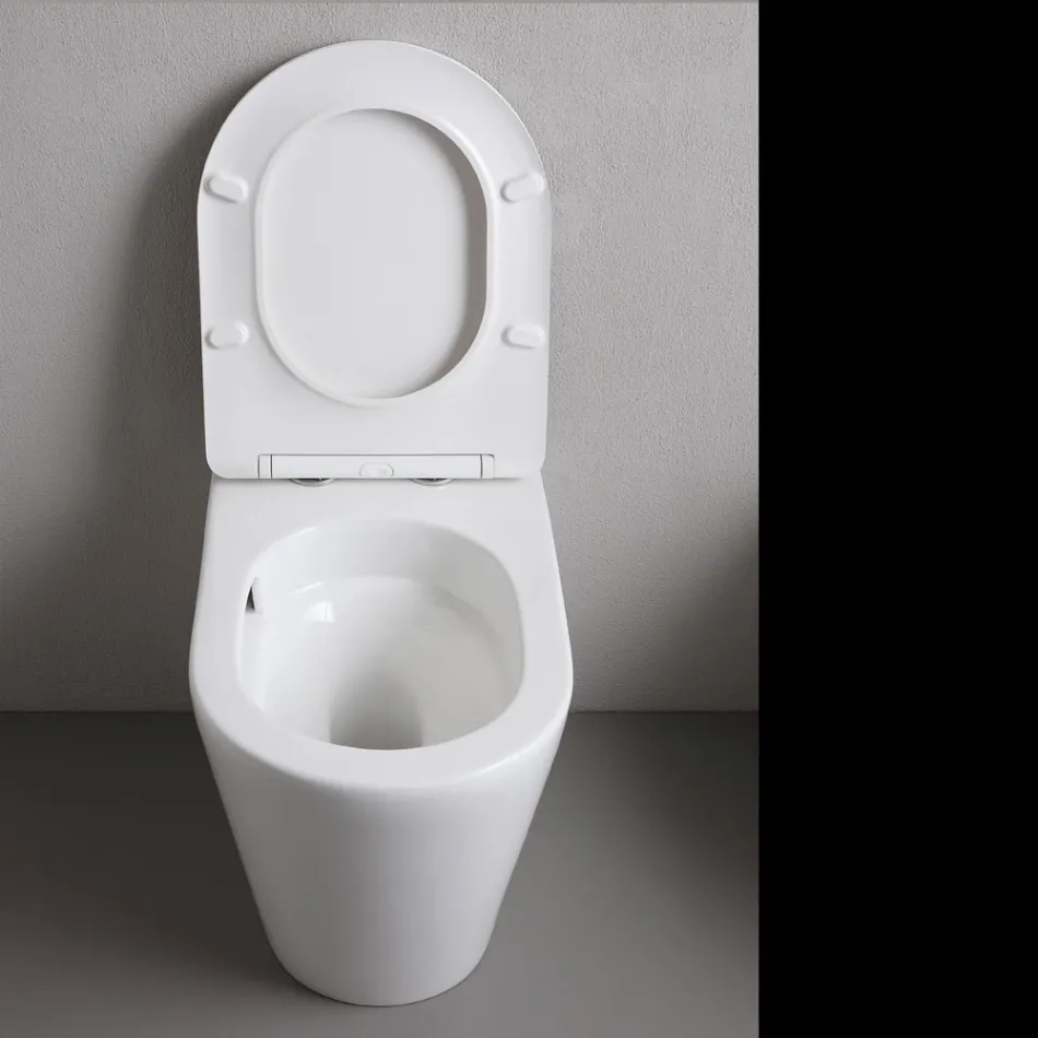 Toilettes sur pied avec abattant fin à fermeture ralentie en céramique blanche - Salice Viadurini