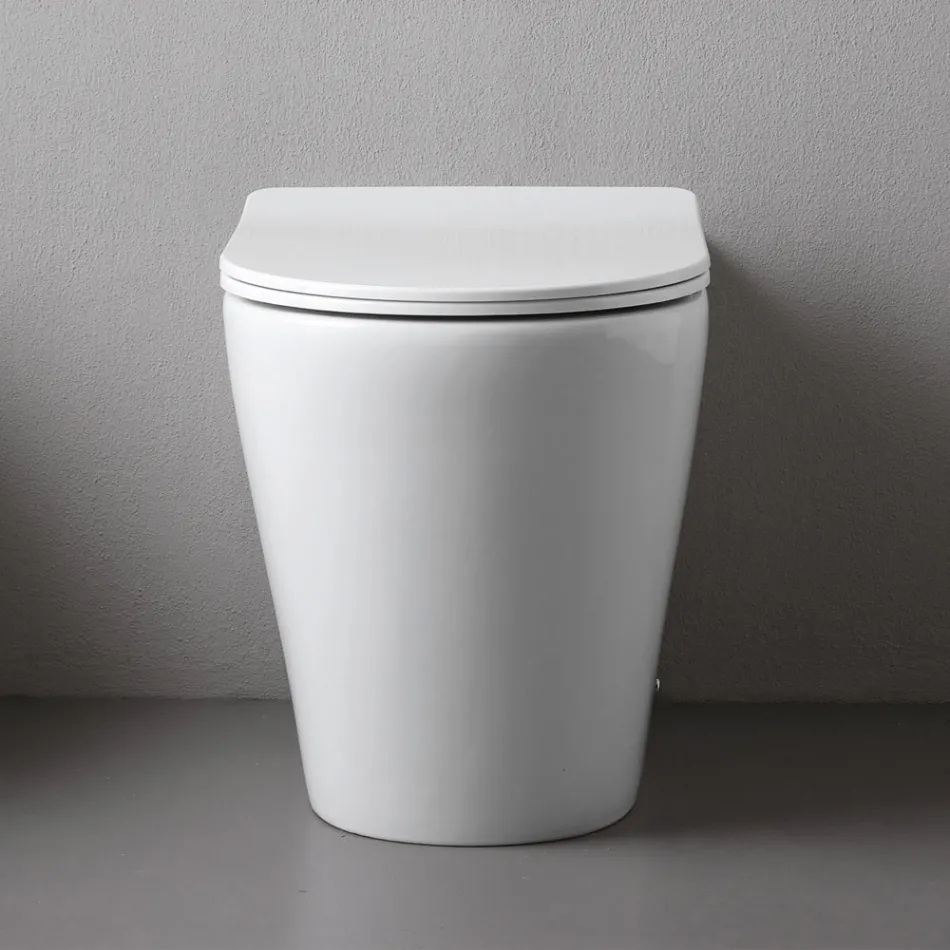 Toilettes sur pied avec abattant fin à fermeture ralentie en céramique blanche - Salice Viadurini