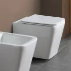 WC suspendu avec abattant en céramique à fermeture ralentie et design moderne - Giunco Viadurini