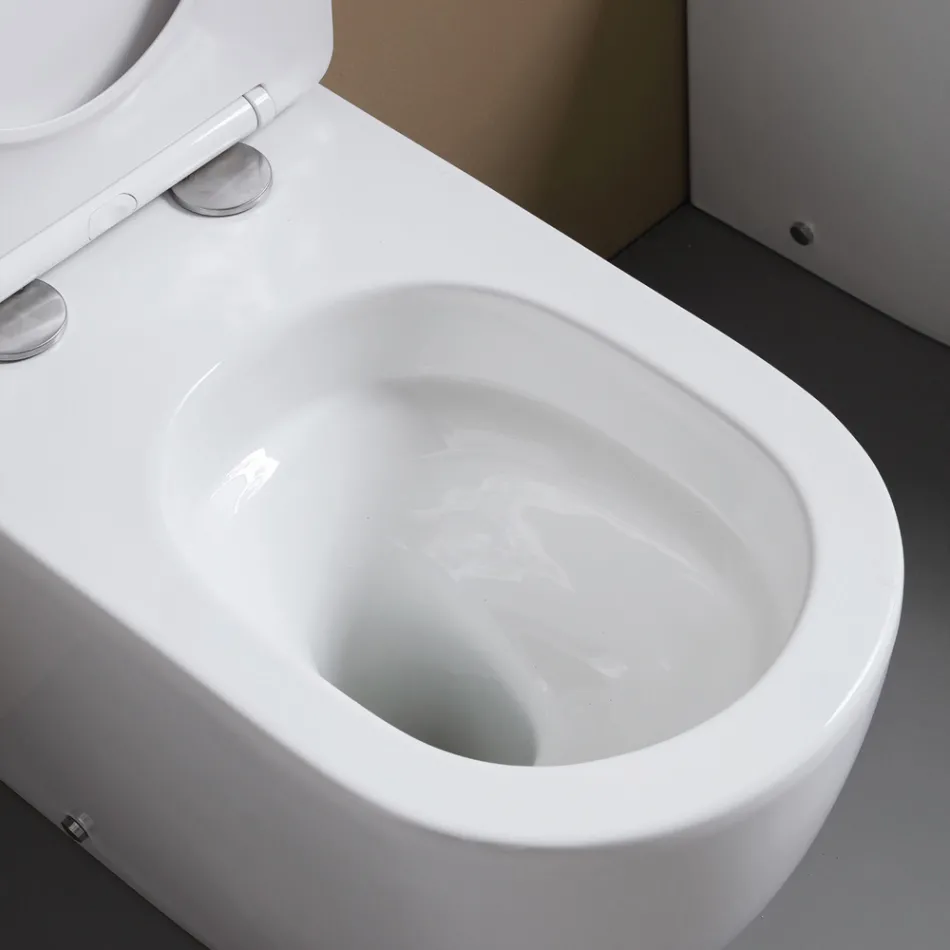 WC suspendu avec abattant à fermeture ralentie en céramique blanche - Elm Viadurini
