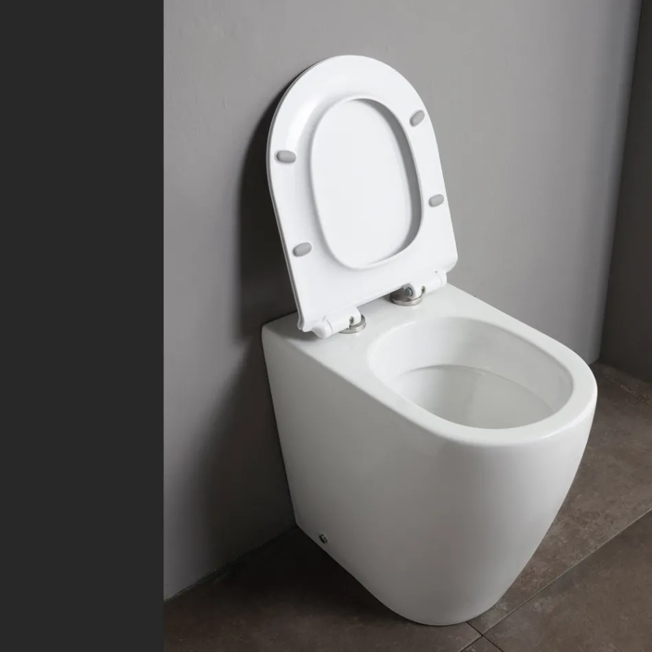Toilettes en céramique Oleander avec chasse d'eau coulissante et siège à fermeture amortie Viadurini