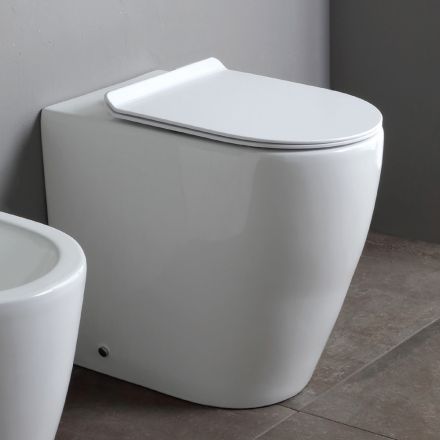Toilettes sans bride avec abattant en céramique thermodurcissable à fermeture amortie - Laurier-rose Viadurini