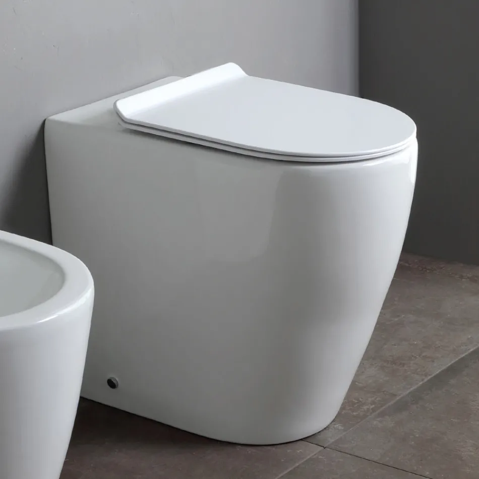 Toilettes sans bride avec abattant en céramique thermodurcissable à fermeture amortie - Laurier-rose Viadurini