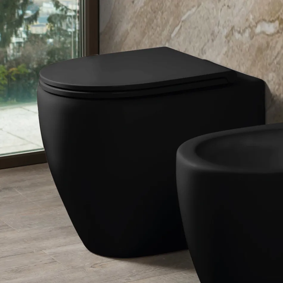 Toilette Aster bicolore en céramique mate sans bride avec siège à fermeture amortie   Viadurini