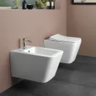 WC suspendu avec abattant en céramique à fermeture ralentie, design moderne - Giunco Viadurini